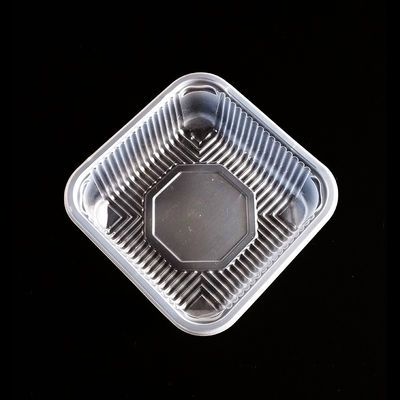 Fruto do alimento que envolve a bandeja de empacotamento que forma a máquina fornecedor