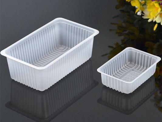 Fruto do alimento que envolve a bandeja de empacotamento que forma a máquina fornecedor